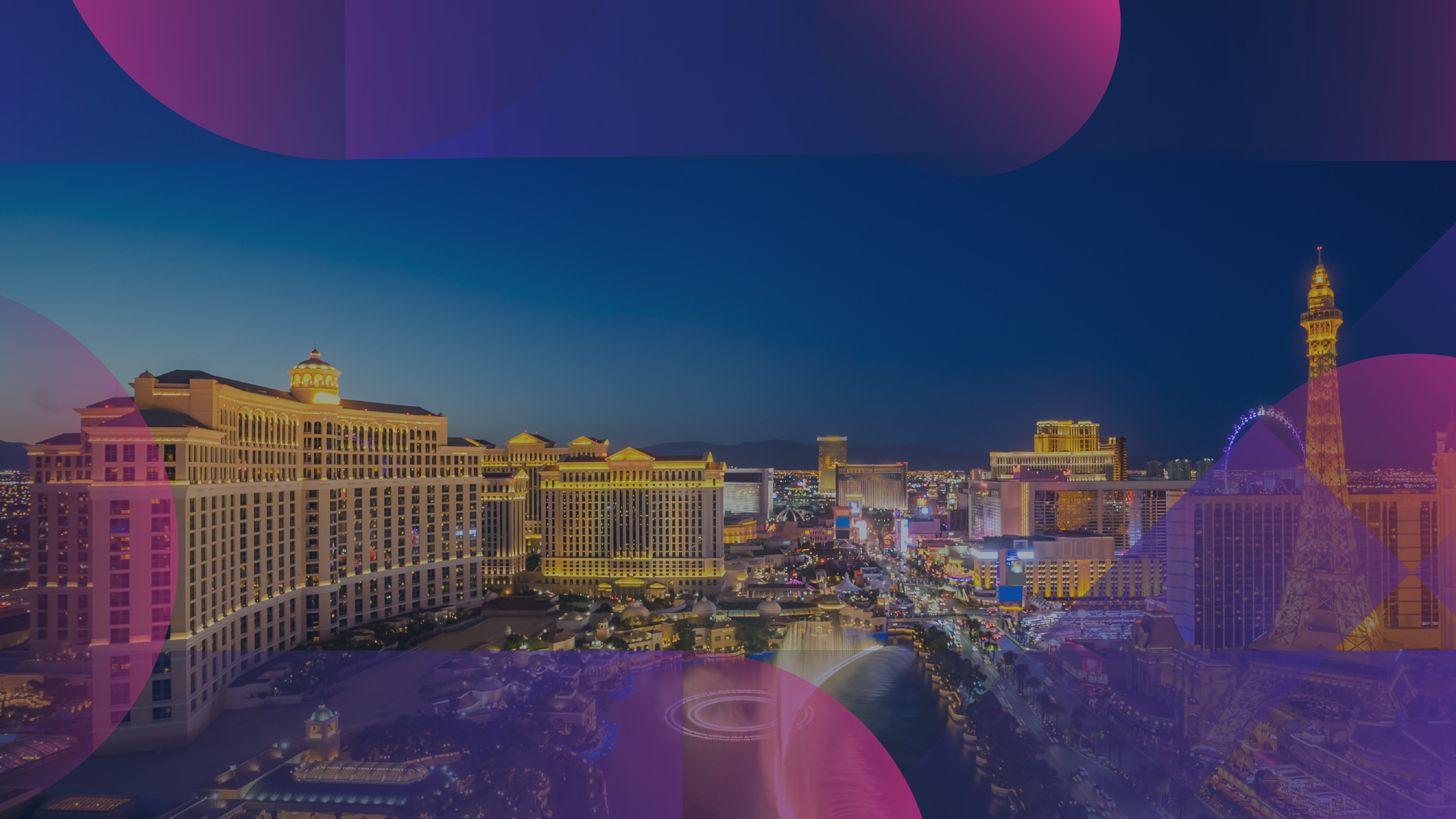 Evening view of the Las Vegas Strip with the Bellagio and Caesars Palace lit, Paris Las Vegas’ Eiffel Tower and the High Roller visible, and the Bellagio fountains in front.