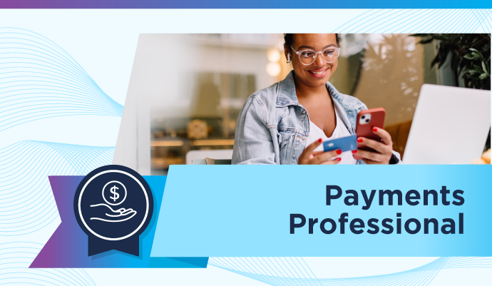 Smiling professional holding a smartphone and credit card while working at a laptop. Text on a blue banner reads ‘Payments Professional’ with an icon of a hand holding a dollar sign inside a badge.